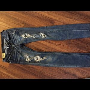 Machine distressed jeans